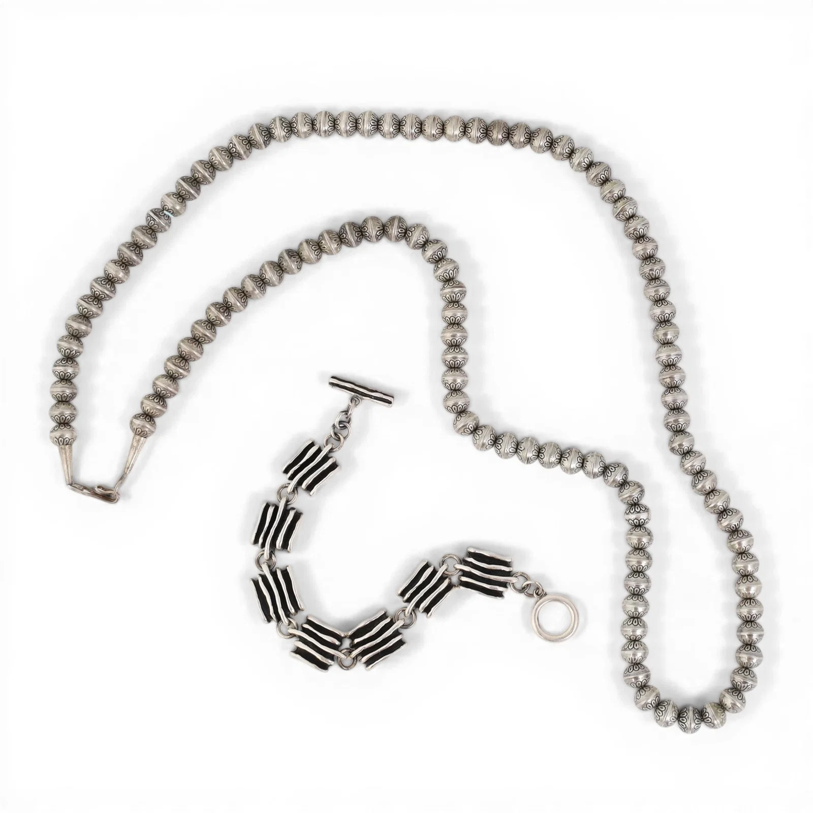 A sterling silver beaded necklace together with a sterling silver bracelet, approx.104.5 grams