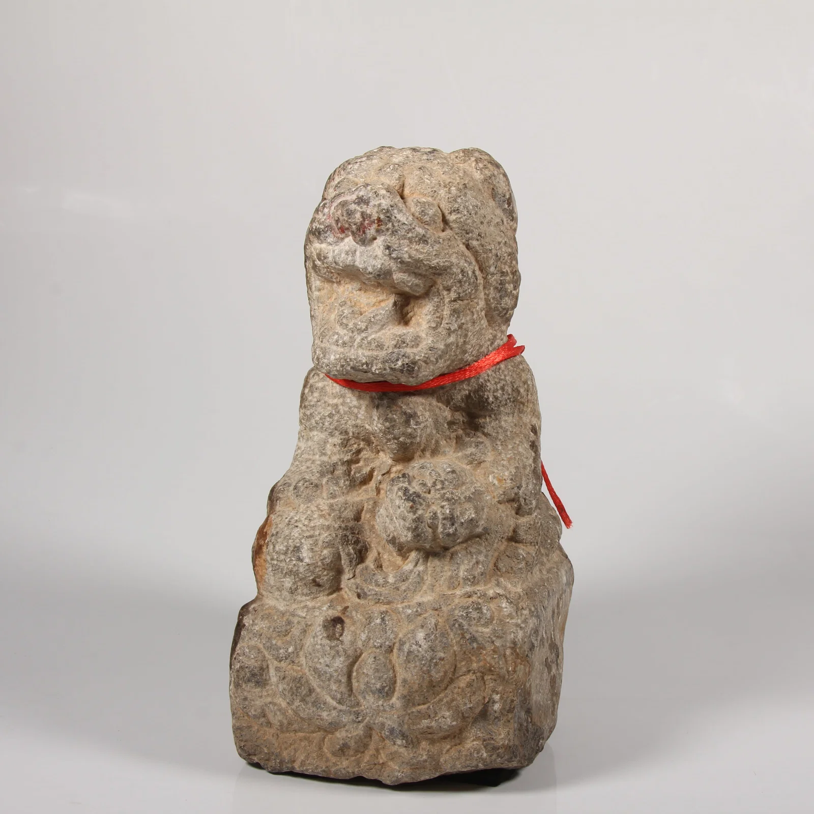 A STONE DESK LION