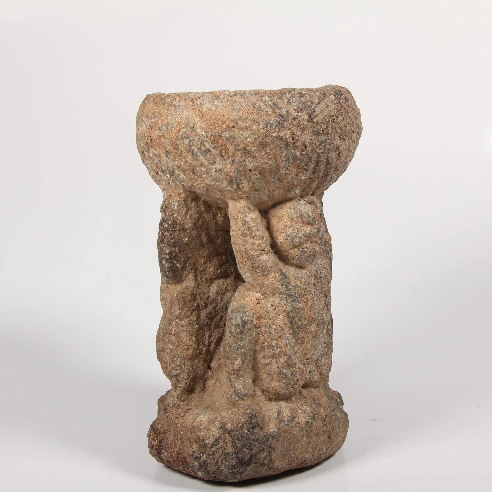 A STONE OIL LAMP