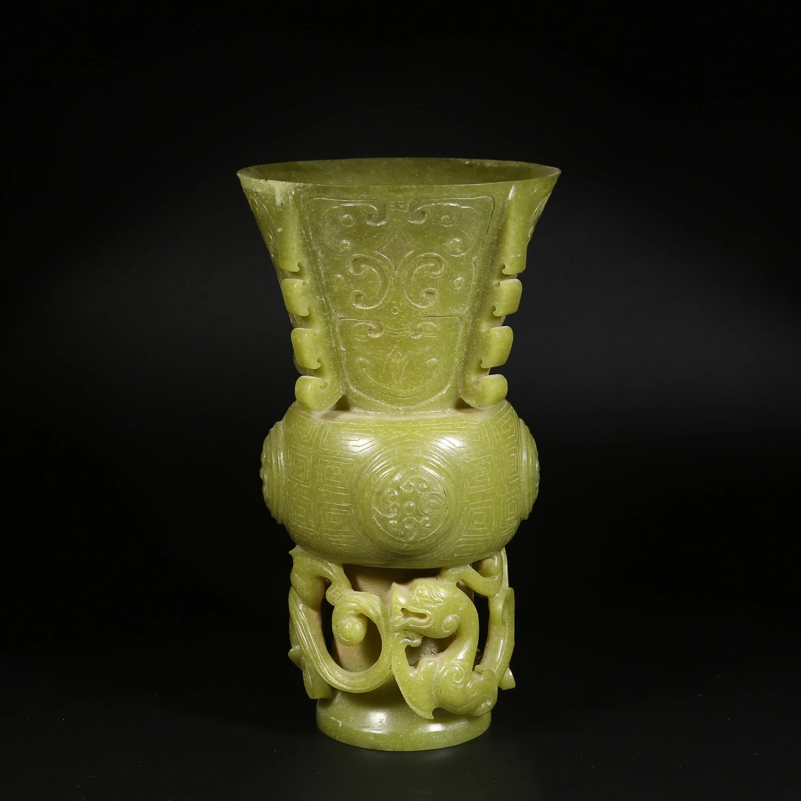 A STONE ZUN WITH SPIRAL PATTERN