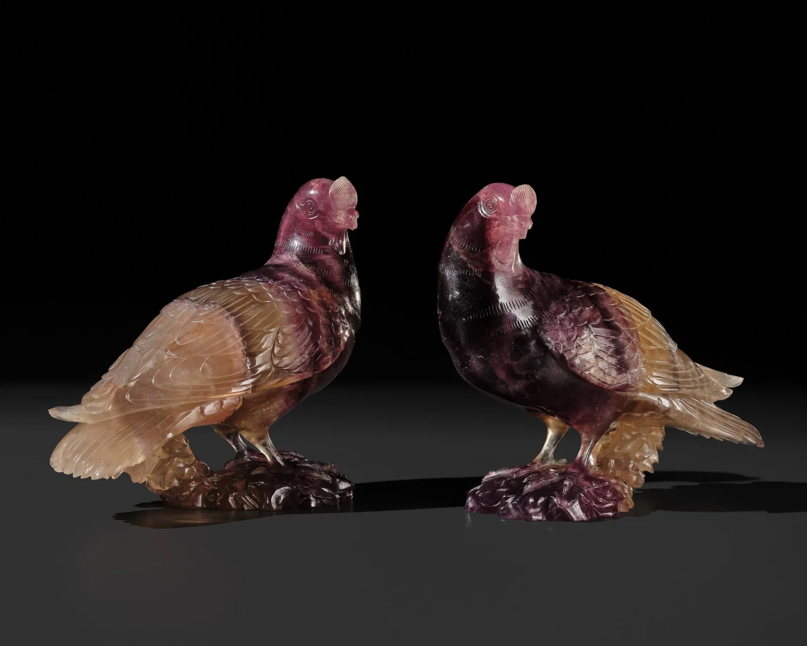 A SUPERB AND UNIQUE PAIR OF AMETHYST DOVES, QIANLONG PERIOD
