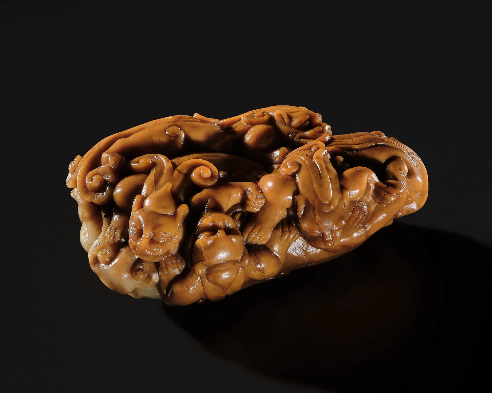 A SUPERB 'LIANJIANGHUANG' SOAPSTONE CARVING OF FIVE CHILONG, 17TH CENTURY