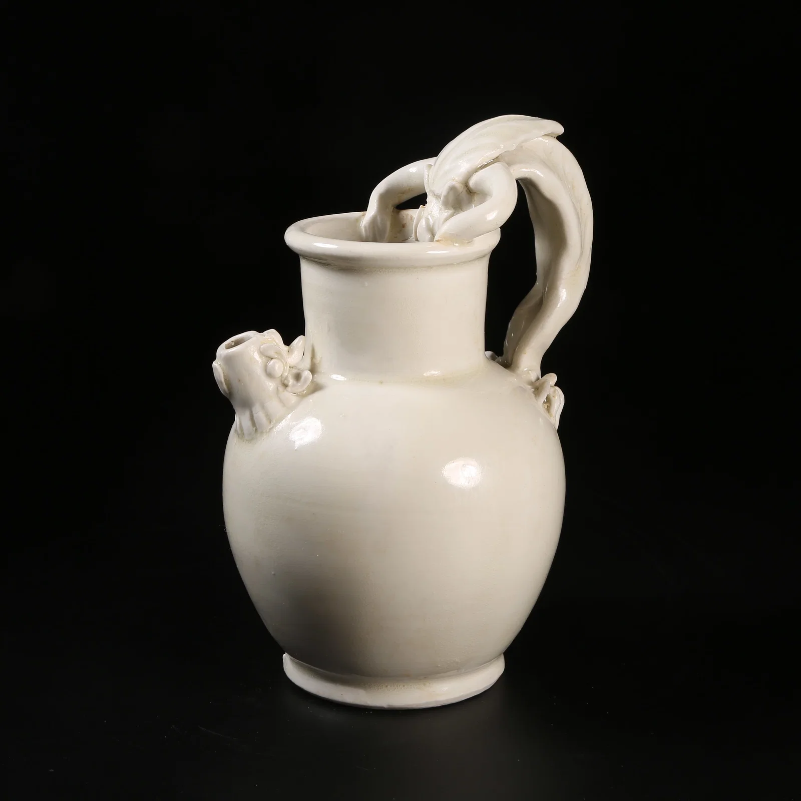 A TANG DYNASTY XING KILN YOU EWER WITH CHILONG HANDLE