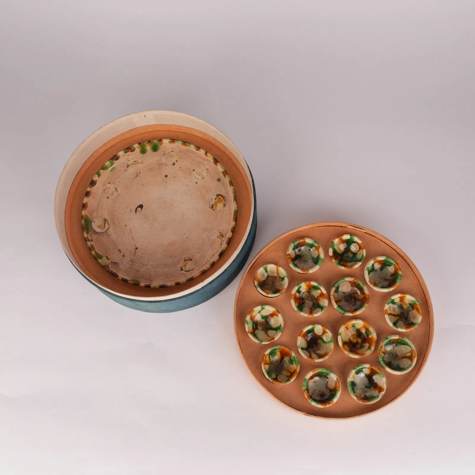 A TANG SANCAI CUP AND SAUCER SET