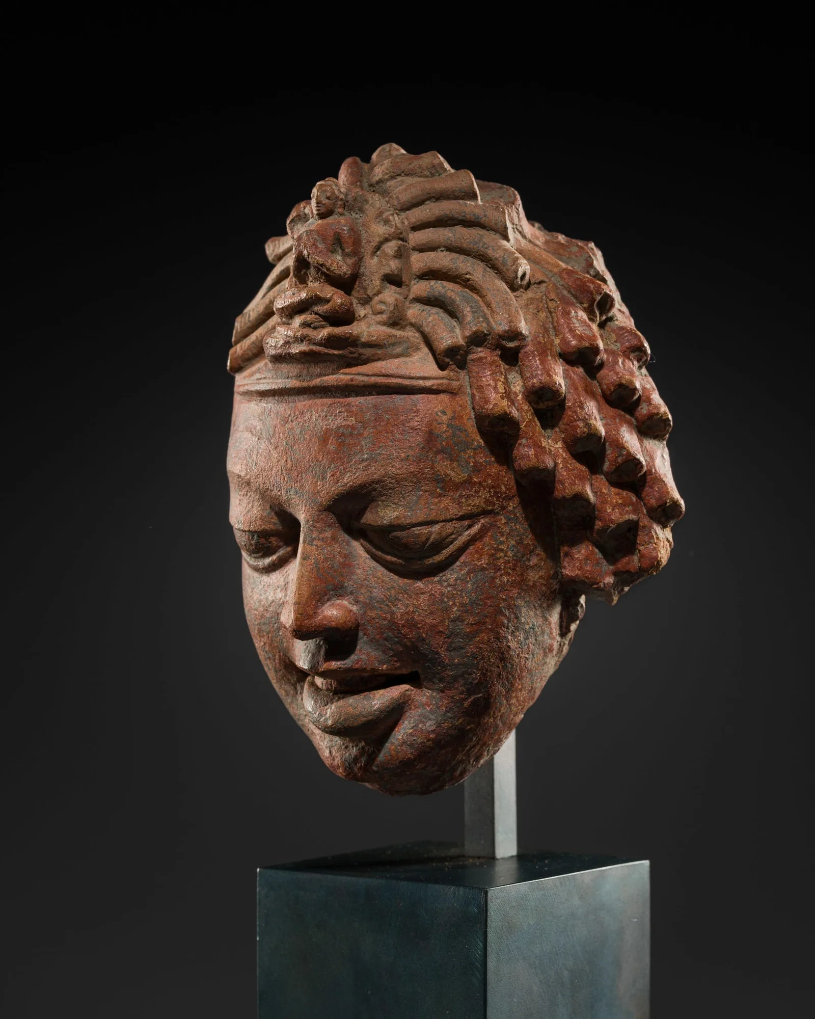 A TERRACOTTA HEAD OF AVALOKITESHVARA, GUPTA PERIOD, 5TH-6TH CENTURY