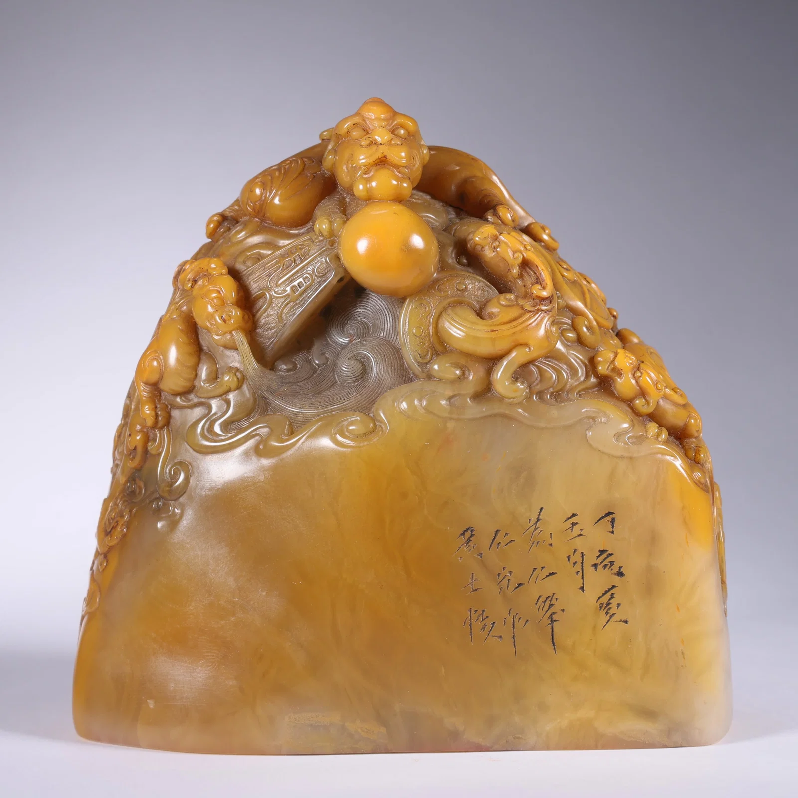 A TIANHUANG STONE FREE-FORM SEAL WITH NINE DRAGONS PLAYING WITH PEARL