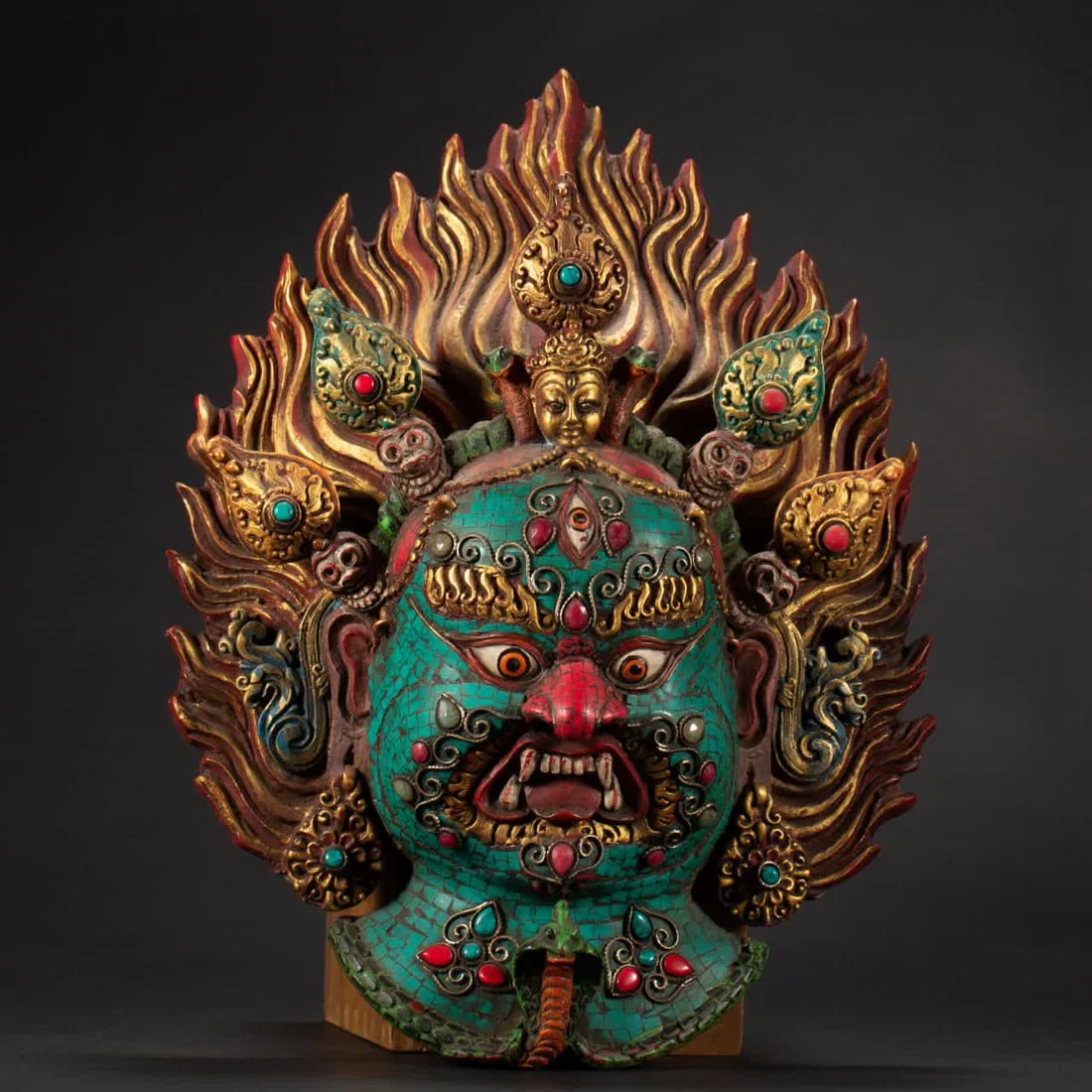 A Tibetan-style turquoise mask from the Qing Dynasty