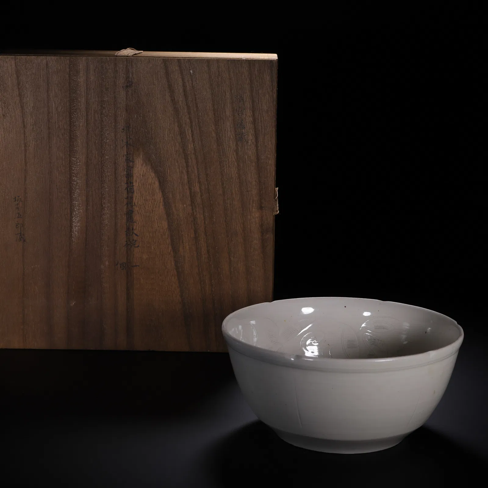 A TING-WARE LOBED BOWL