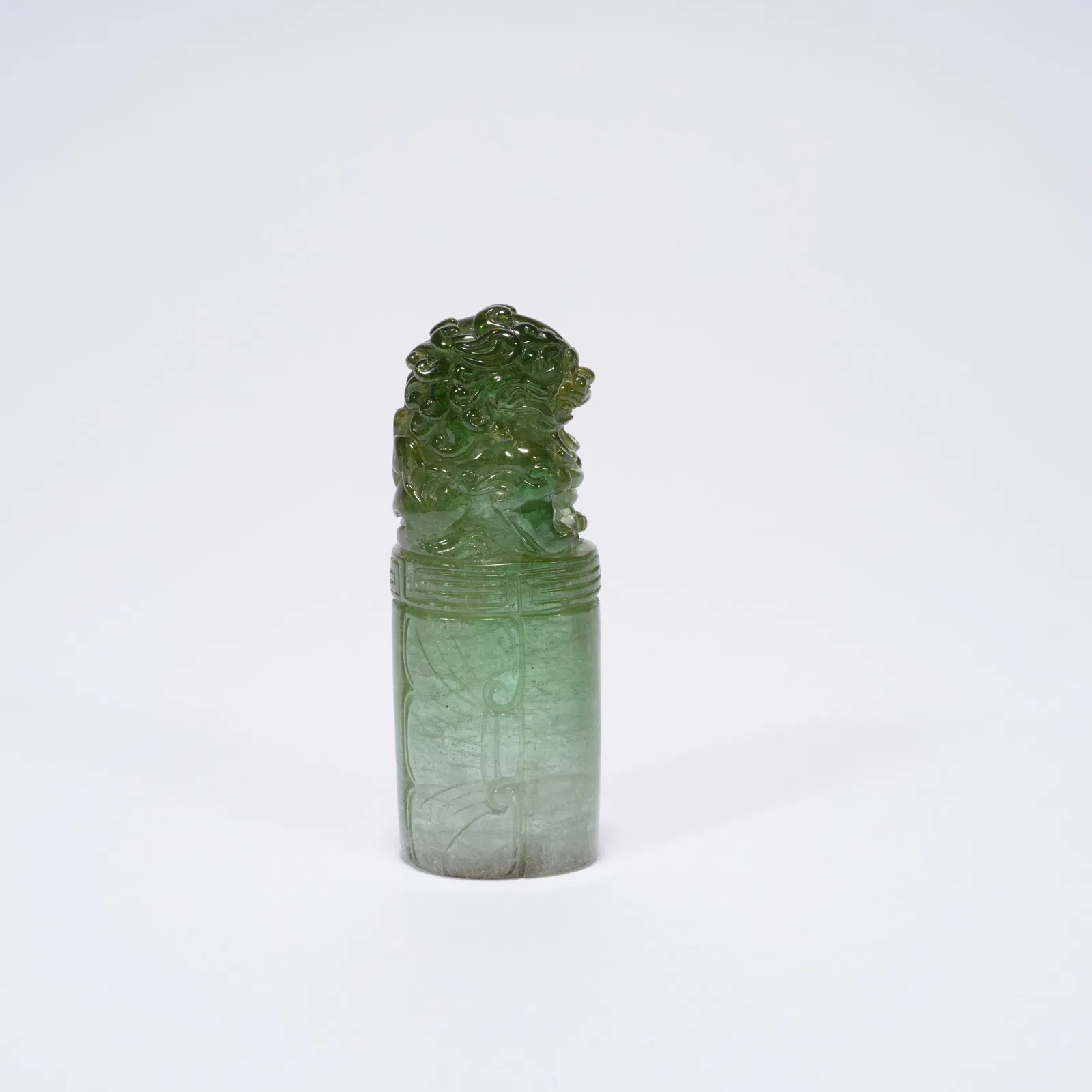 A TOURMALINE CARVED TIGER-HANDLE SEAL