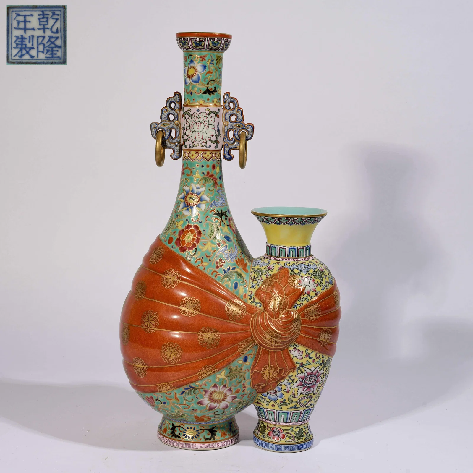 A TURQUOISE-GREEN GROUND ENAMEL "BAO FU" PATTERN DOUBLE VASE