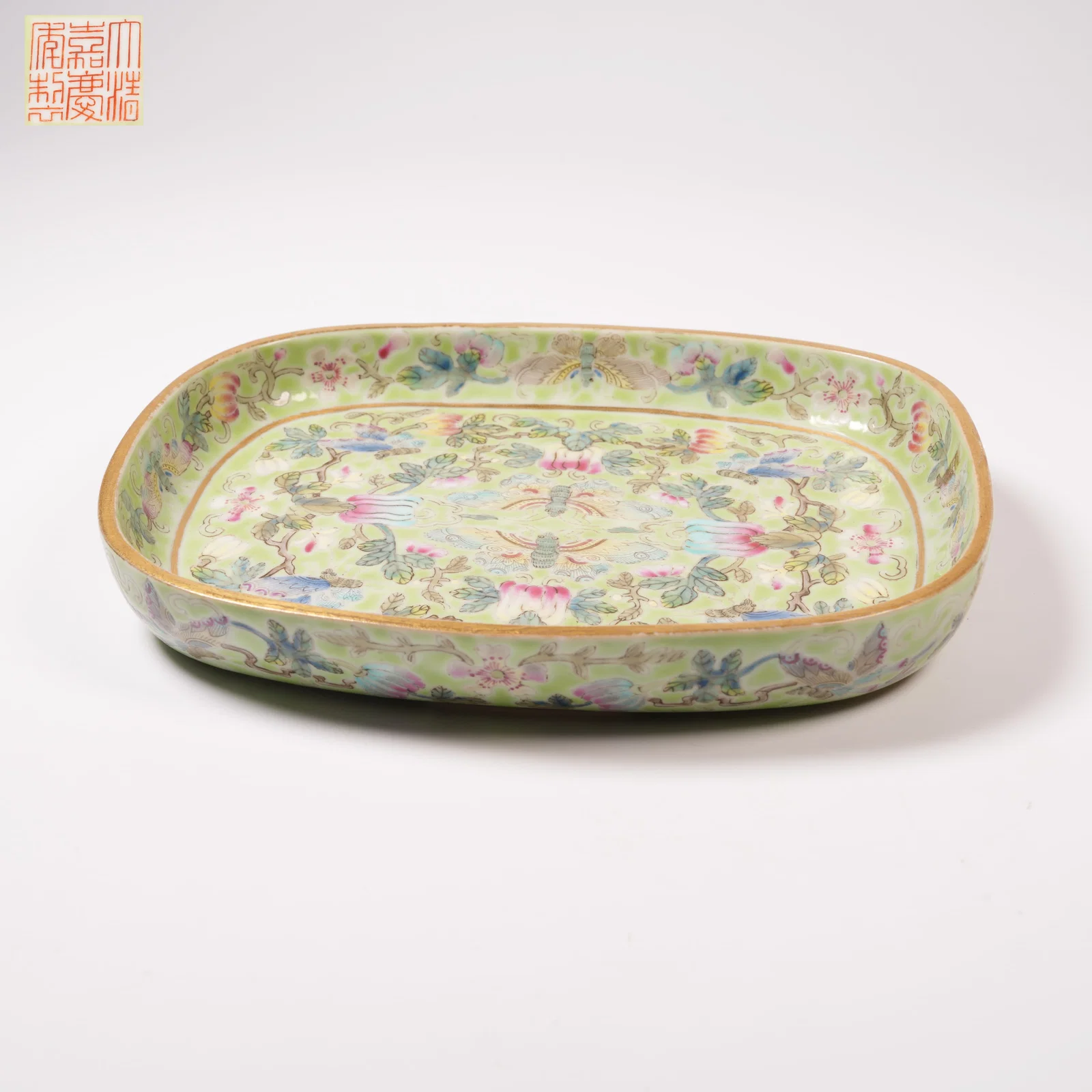 A TURQUOISE-GROUND FAMILLE ROSE BRUSH WASHER WITH FLORAL-AND-BUTTERFLY MOTIF