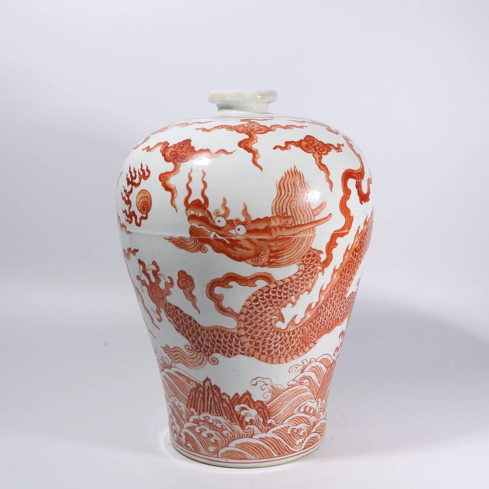 A UNDERGLAZE RED SEA DRAGON CHASING PEARL MEIPING