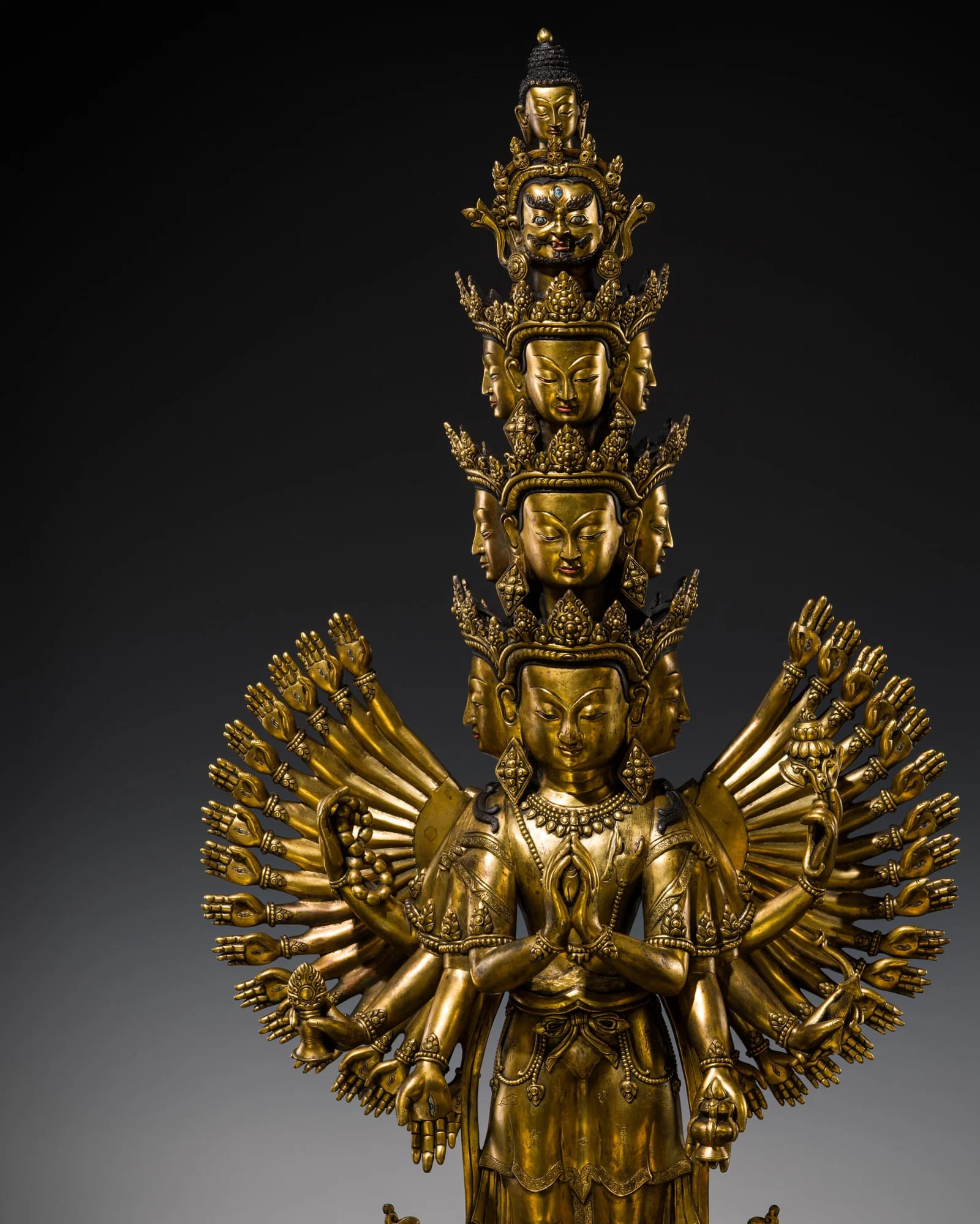 A VERY LARGE GILT COPPER ALLOY FIGURE OF AVALOKITESHVARA SAHASHRABHUJA EKADASHAMUKHA,