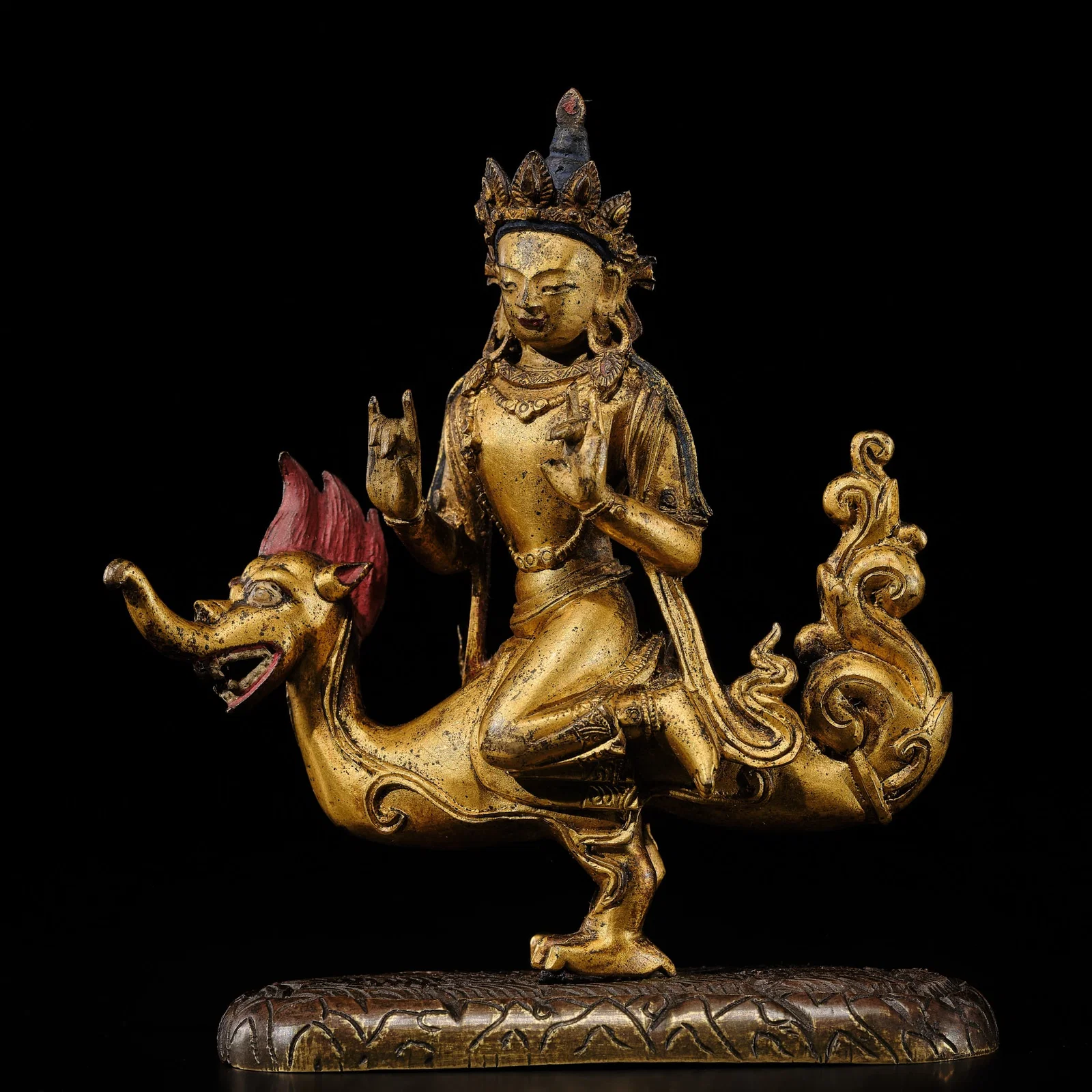 A VERY RARE GILT COPPER ALLOY FIGURE OF VARUNA, QIANLONG PERIOD