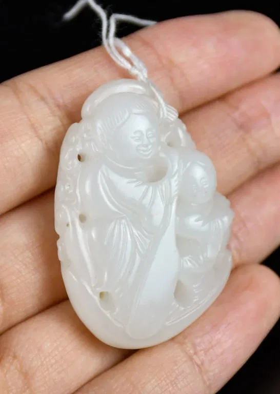 A White Jade Figural Carving Qing