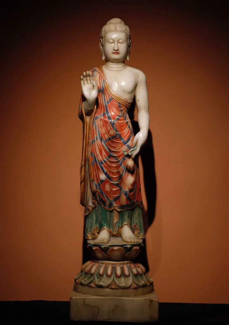 A white jade painted Buddha statue of the Tang Dynasty