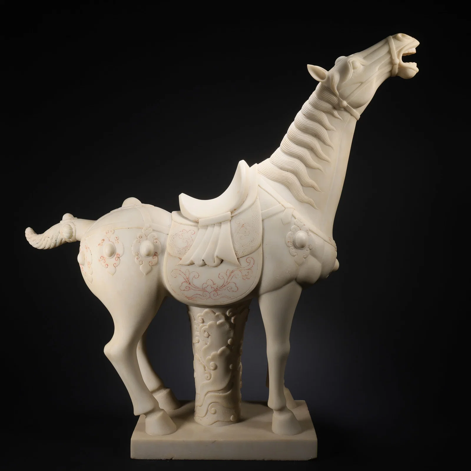 A WHITE MARBLE HORSE