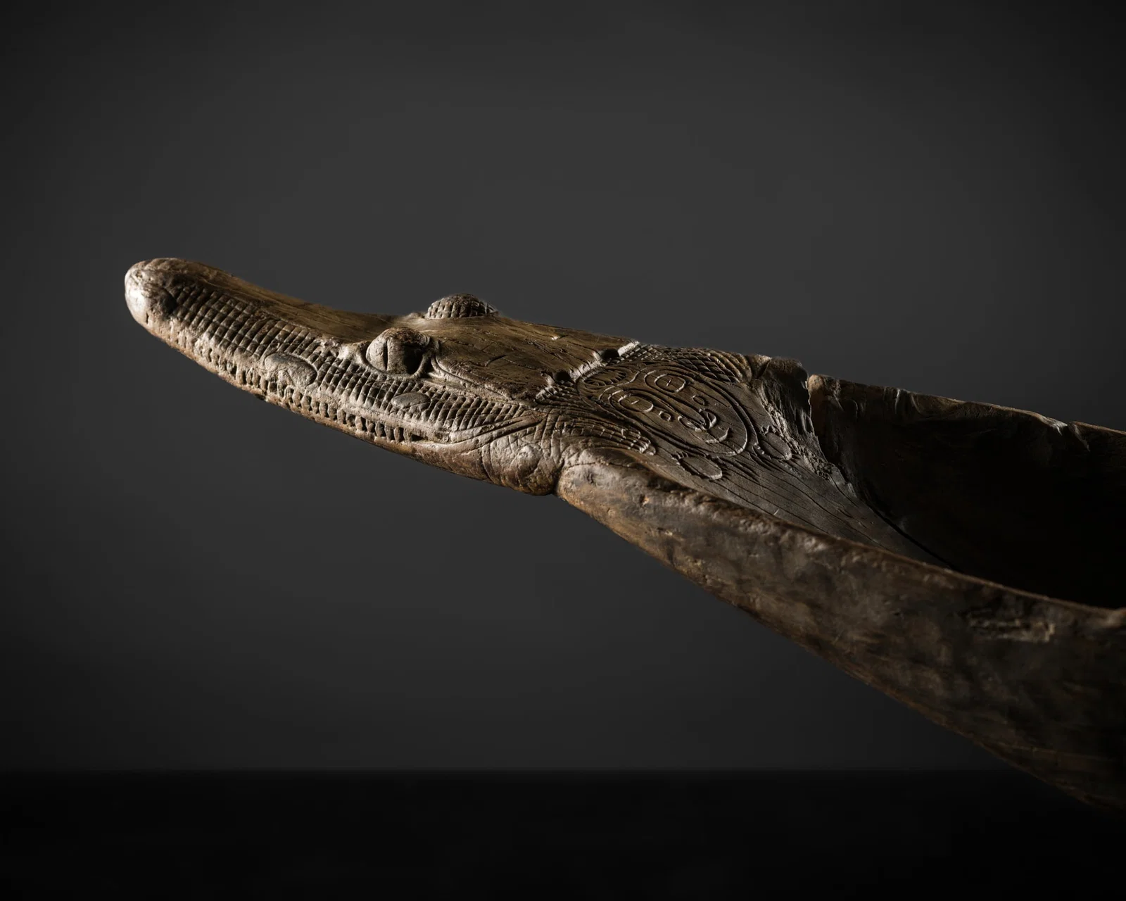 A WOOD CANOE PROW CARVED AS A CROCODILE HEAD, IATMUL PEOPLE, MIDDLE SEPIK RIVER