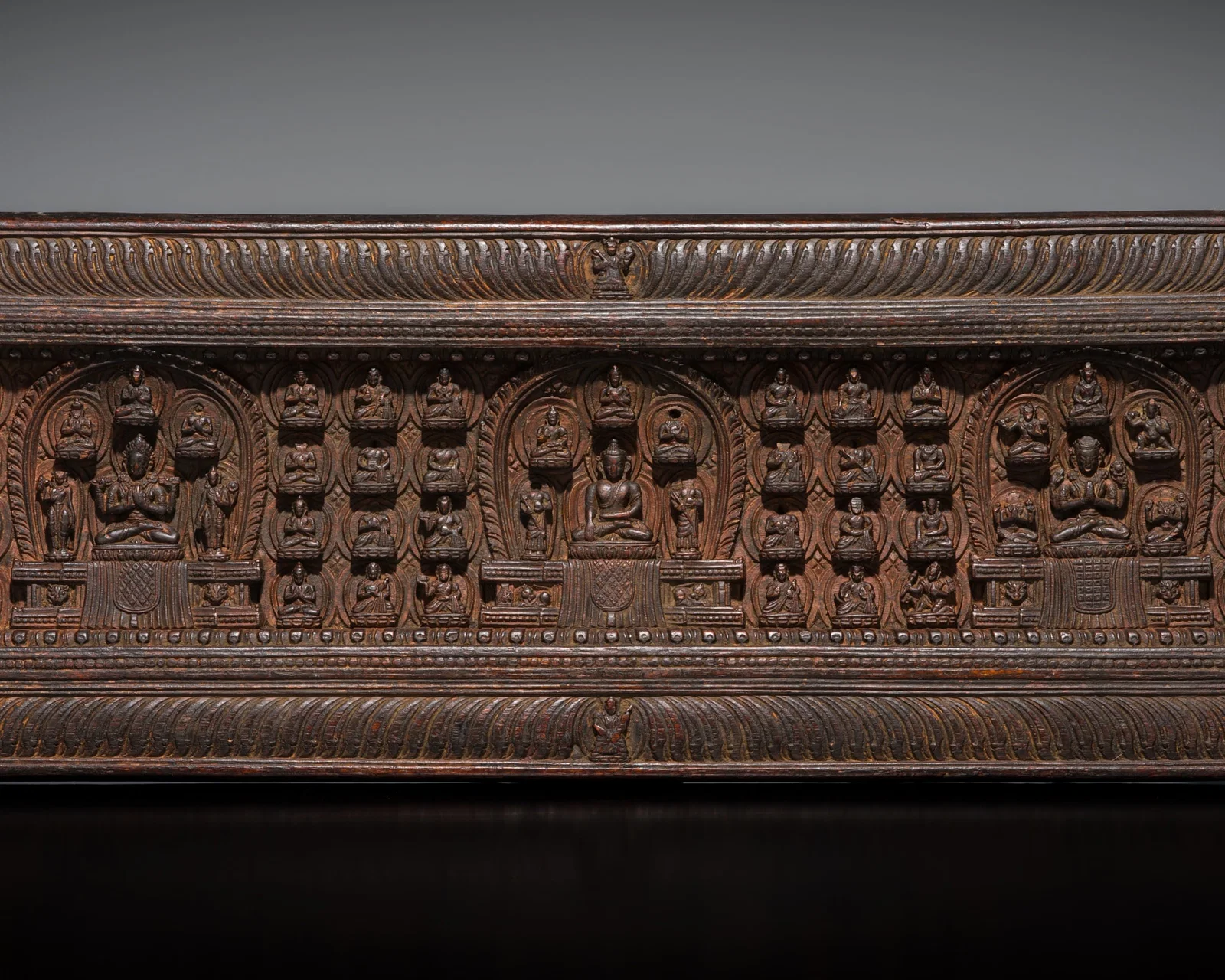 A WOOD MANUSCRIPT COVER WITH BUDDHA SHAKYAMUNI, TIBET, 14TH-15TH CENTURY