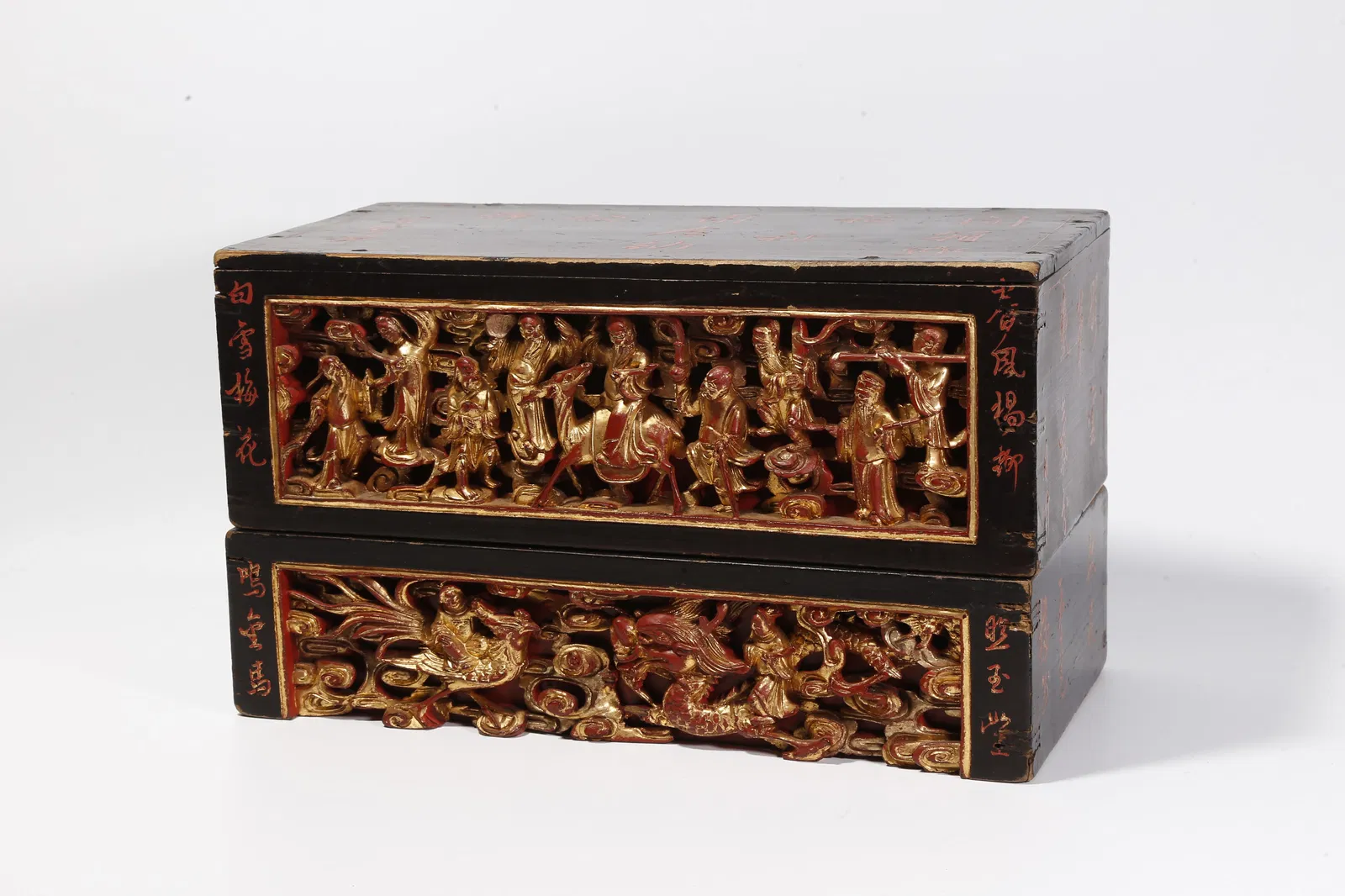 A WOOD WITH LACQUER AND GILDED COVERED BOX WITH IMMORTALS CELEBRATING LONGEVITY