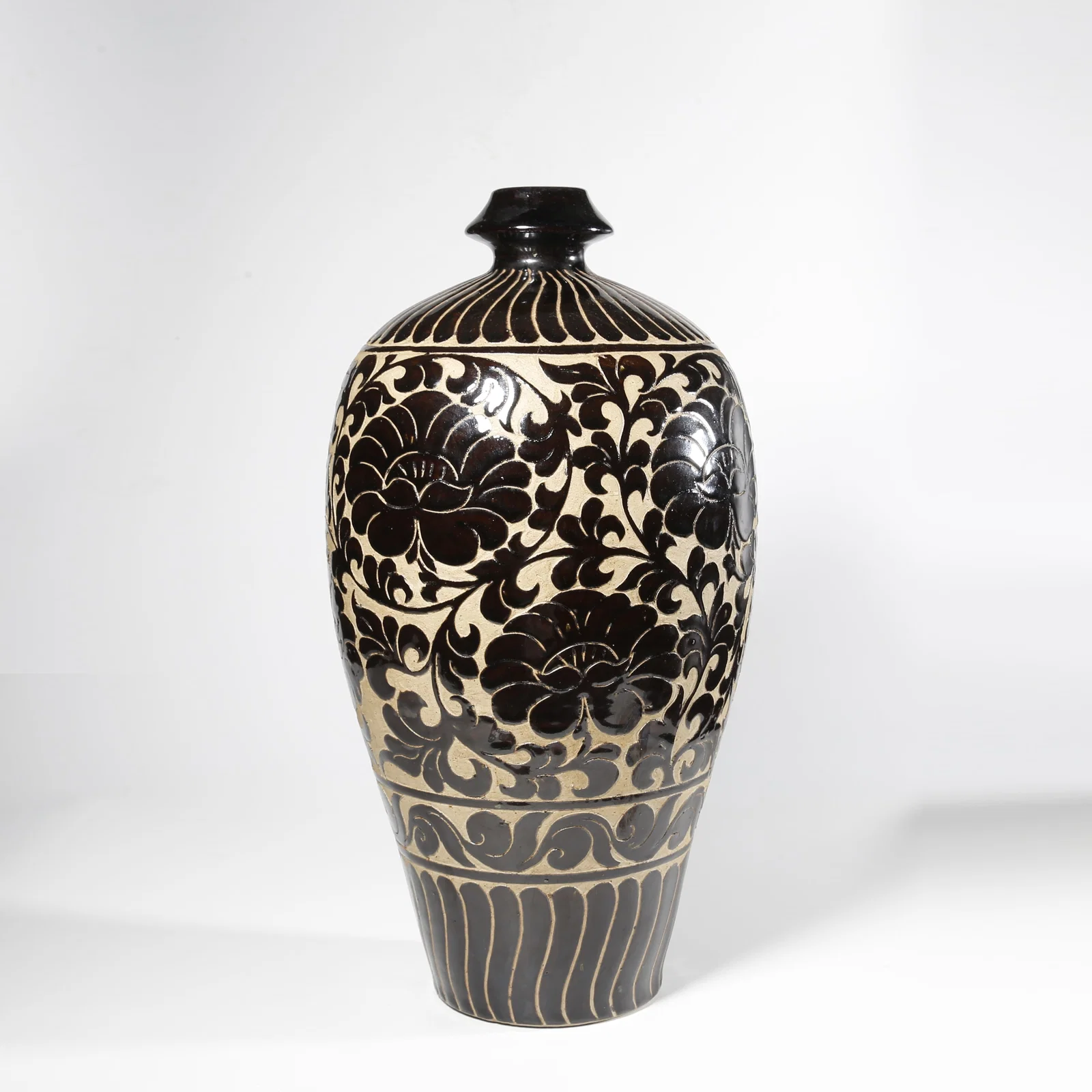 A YAOZHOU KILN MEIPING WITH INTERTWINED FLOWER AND VINE MOTIF