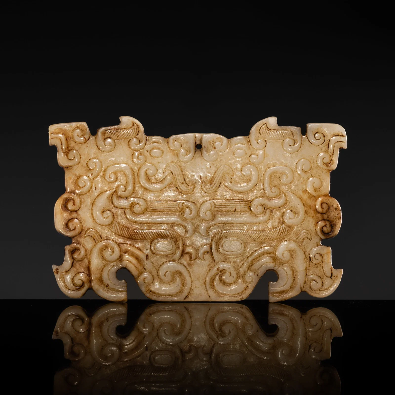 A YELLOW-BEIGE JADE 'TAOTIE' MASK, EASTERN ZHOU DYNASTY