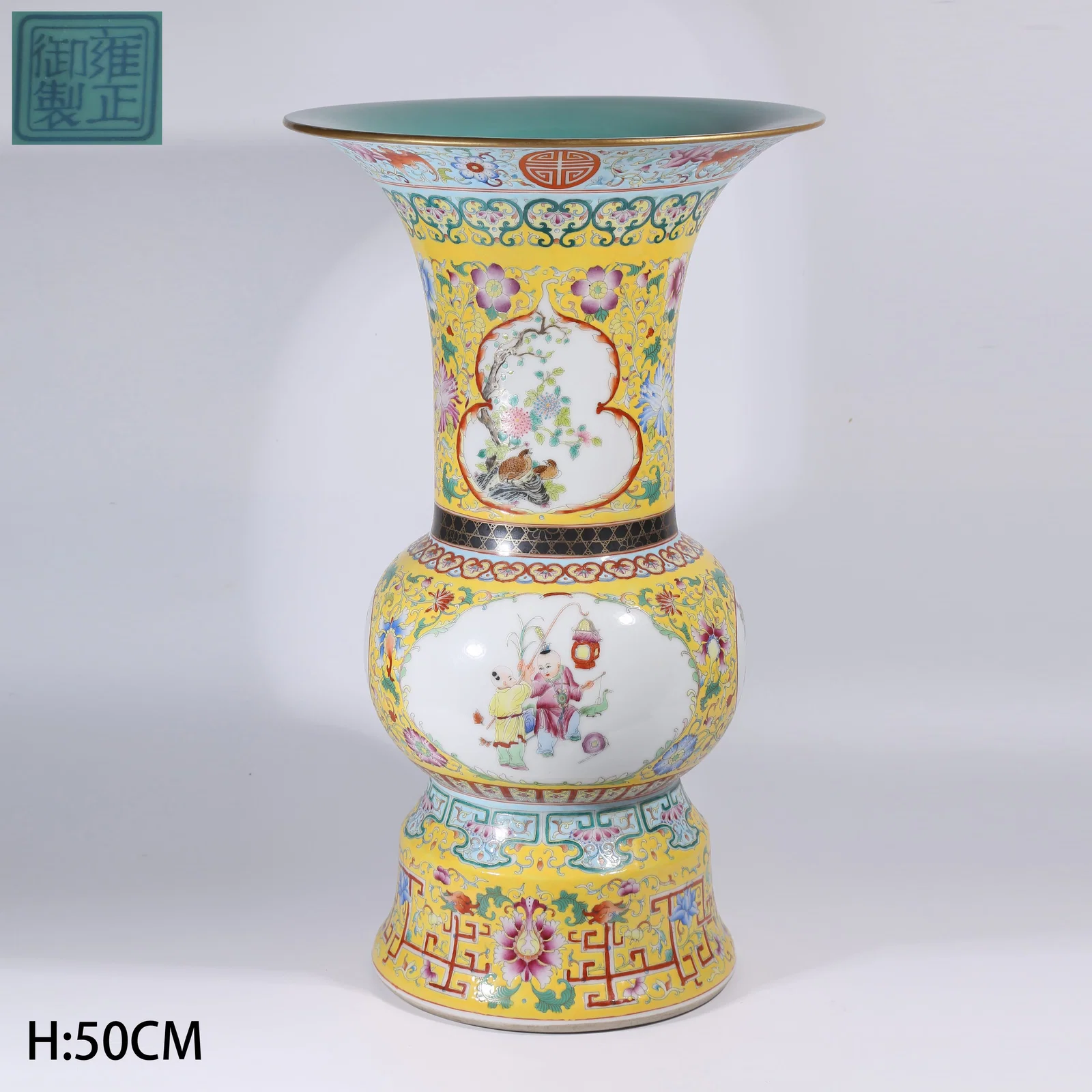 A YELLOW-GROUND FAMILLE ROSE FLOWER GU WITH OPENWORK AND CHILDREN AT PLAY