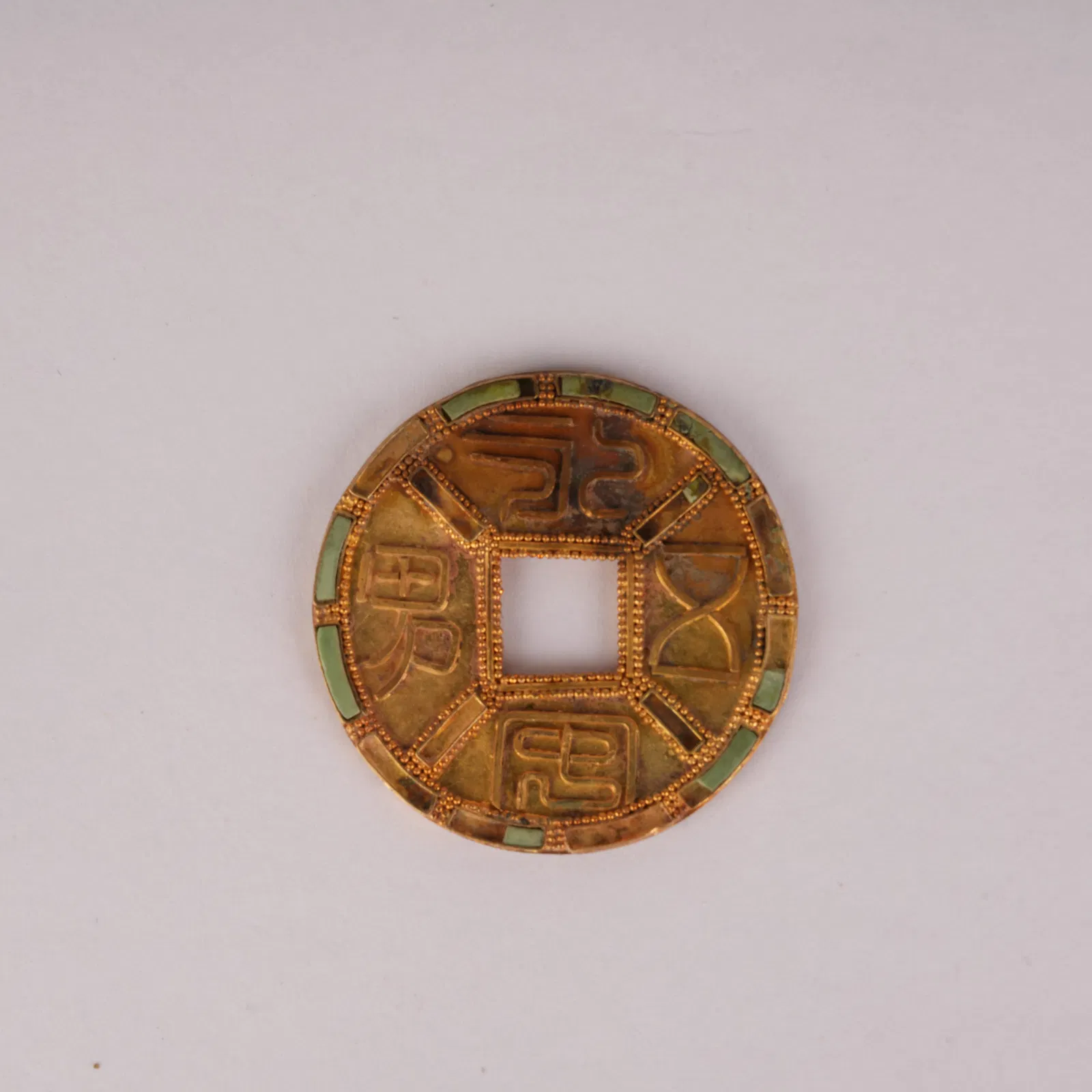 A YONGAN FIVE-SONS GOLD COINS WITH GEM INLAY, TANG DYNASTY