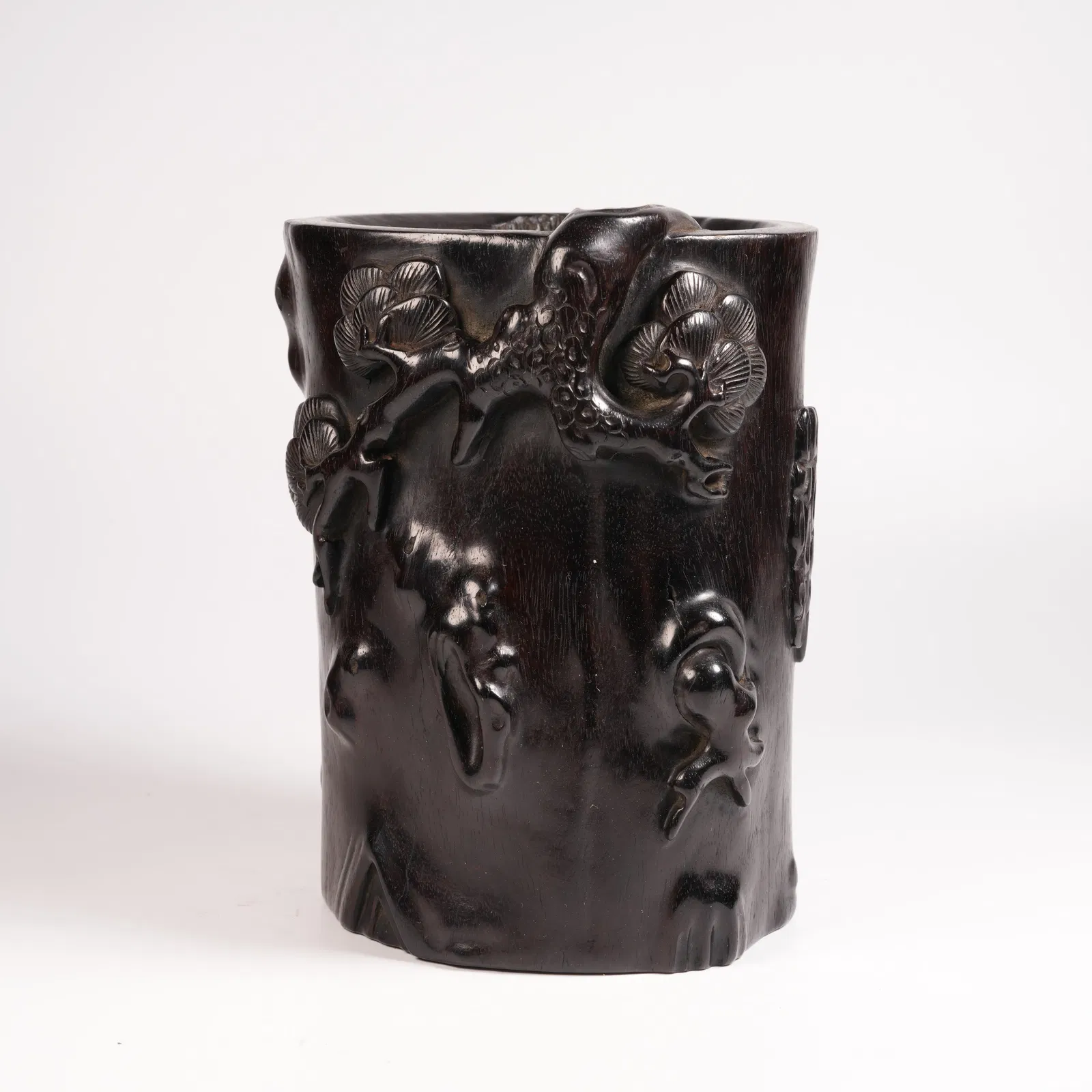 A ZITAN BRUSH POT WITH PLUM BLOSSOM MOTIF