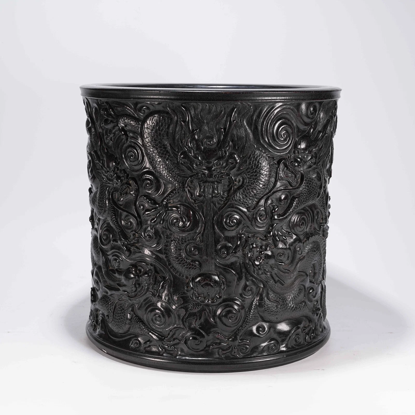 A ZITAN LARGE BRUSH POT WITH CLOUD AND DRAGON MOTIFS