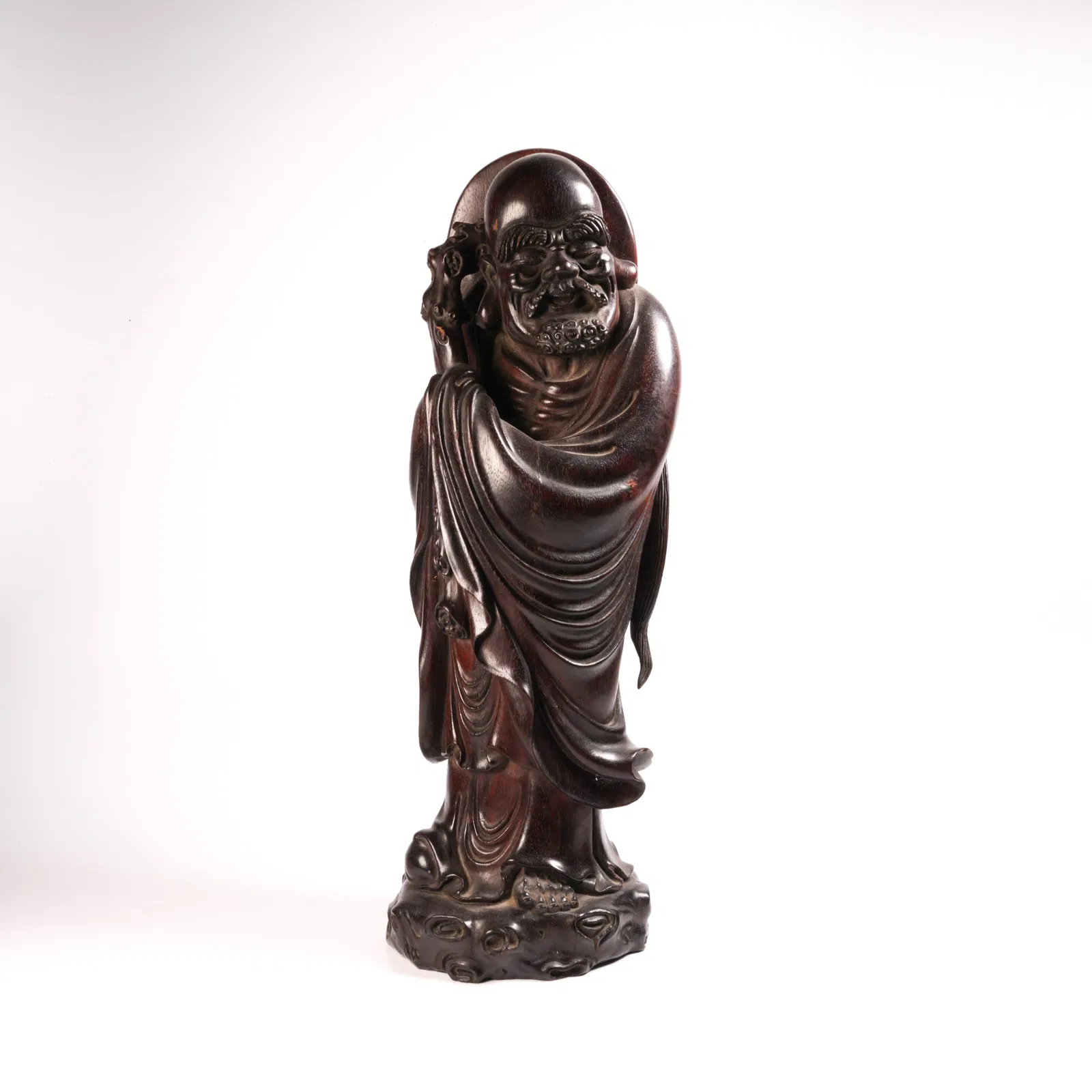 A ZITAN STANDING ARHAT FIGURINE