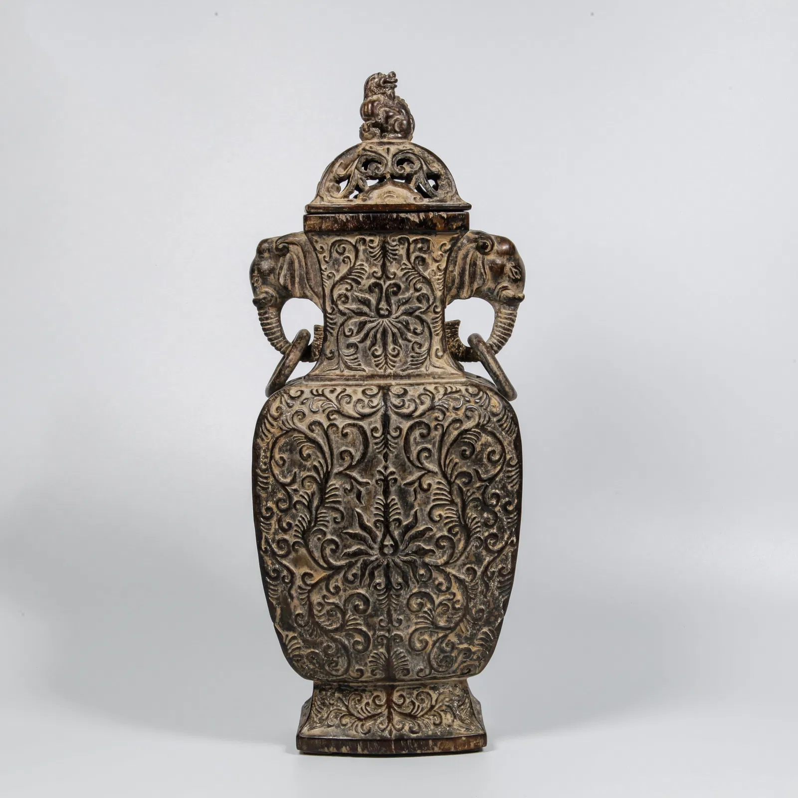 A ZITAN WOOD CARVED INTERTWINED FLOWER PATTERN DOUBLE-ELEPHANT-HANDLED COVERED BOTTLE
