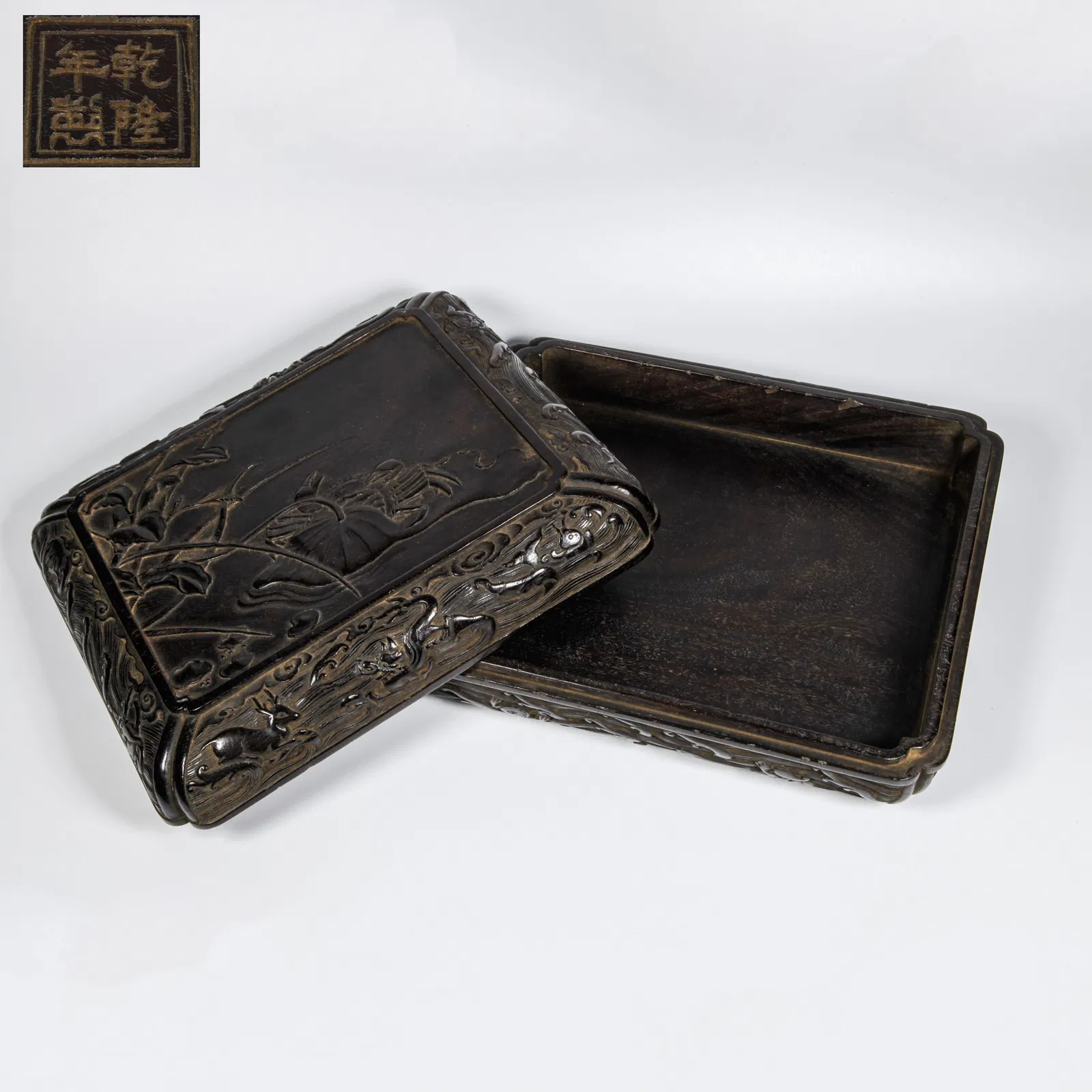 A ZITAN WOOD CARVED LOTUS PATTERN COVERED BOX