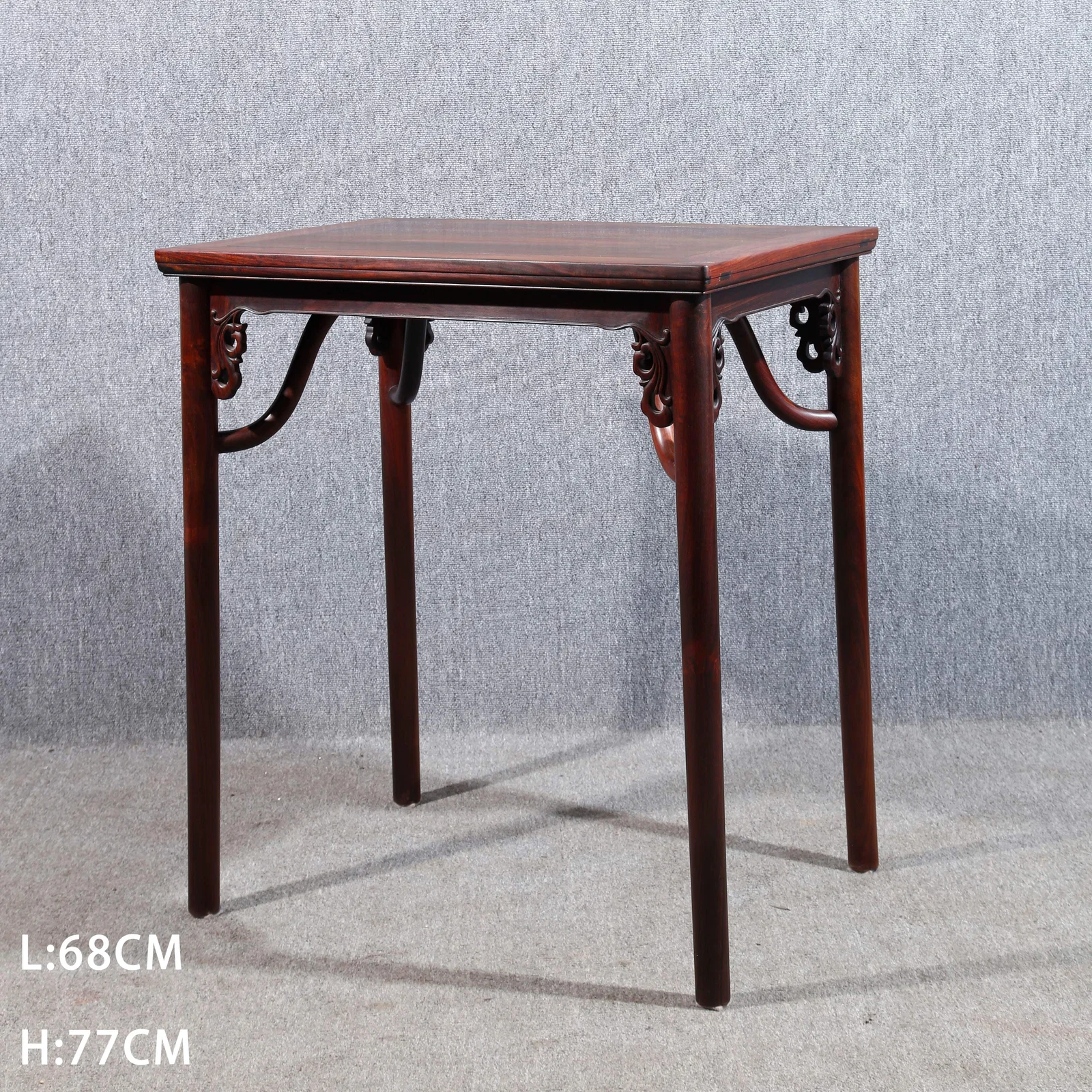 A ZITAN WOOD CARVED TEA TABLE