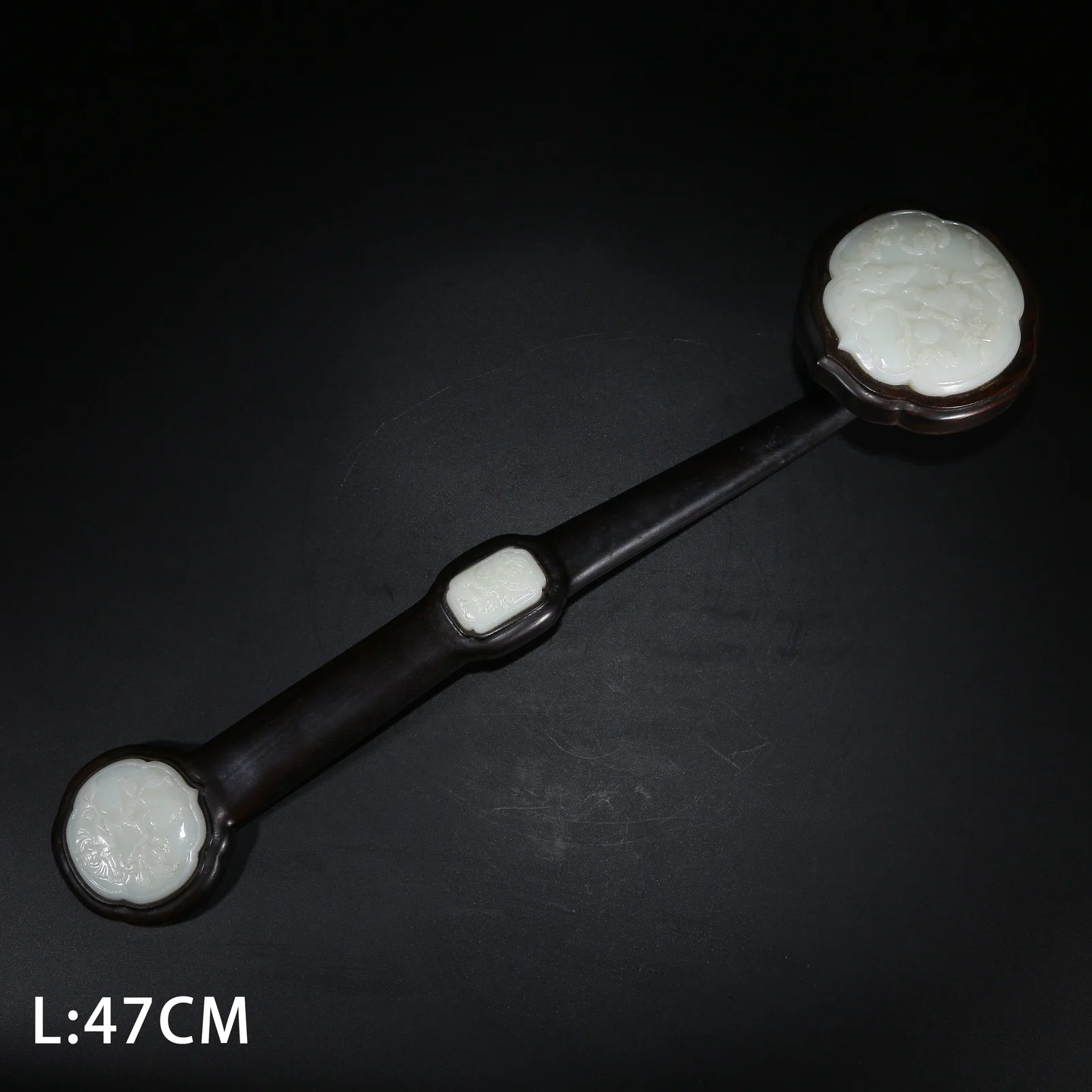A ZITAN WOOD RUYI SCEPTER INLAID WITH HETIAN WHITE JADE "FORTUNE AND LONGEVITY" PATTERN