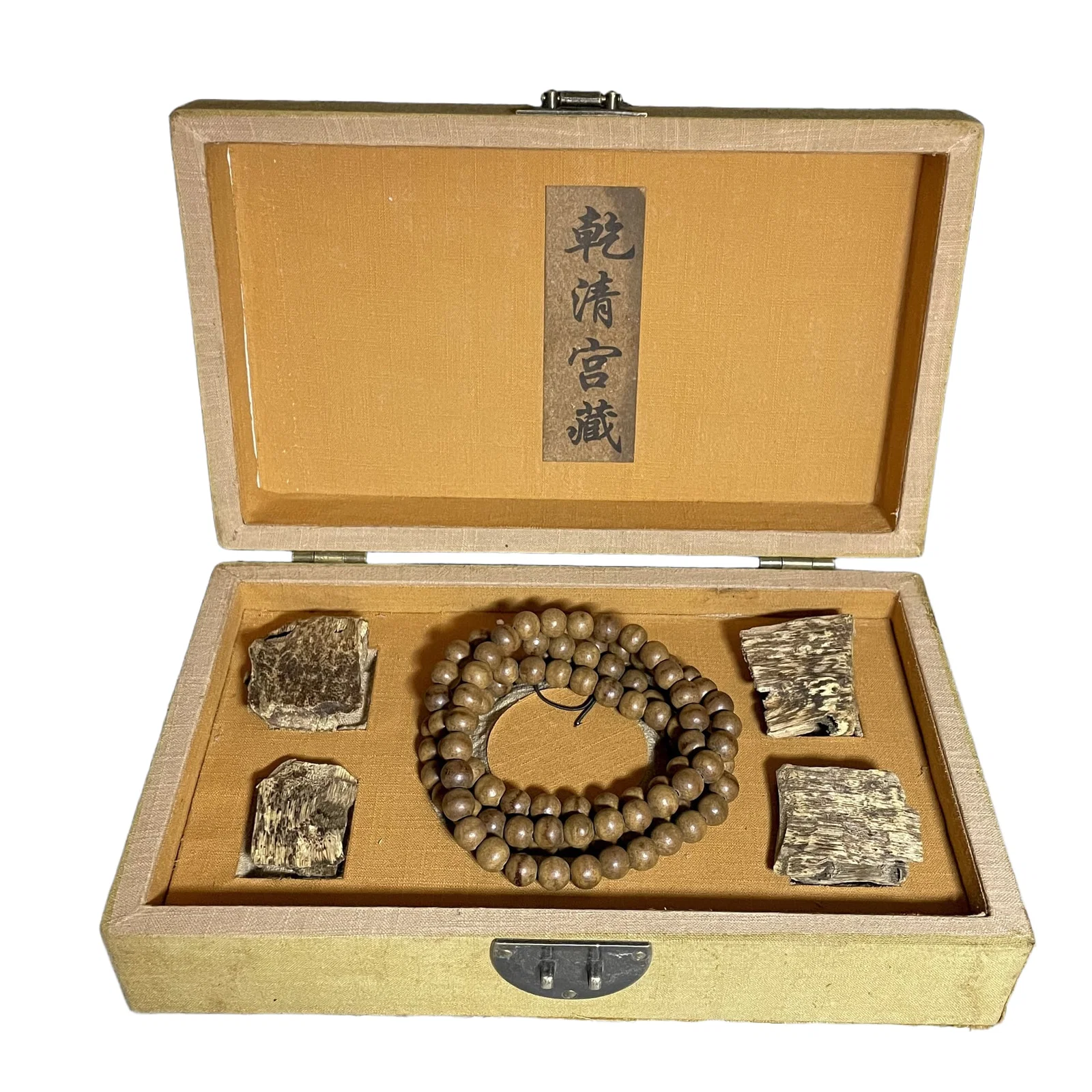 Agarwood Buddha bead necklace, with matching incense blocks.