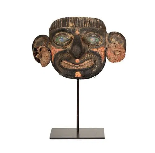 An African Painted and Polychrome Wood Mask
