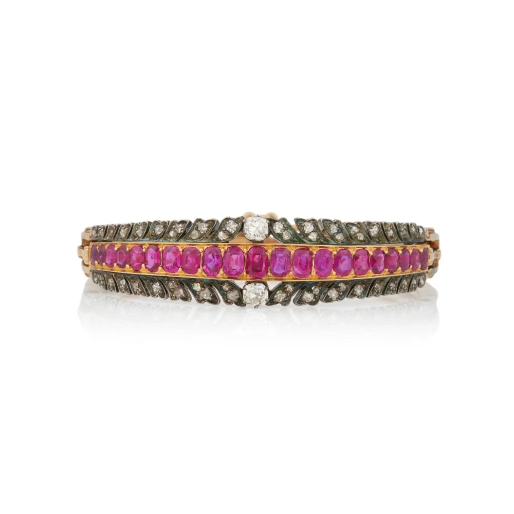 AN ANTIQUE RUBY AND DIAMOND BANGLE BRACELET