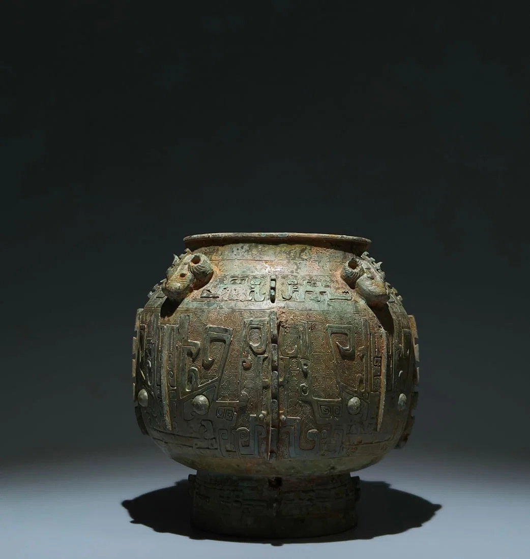 An Archaic Bronze Beast-Face Pattern Goat-head Food Vessel