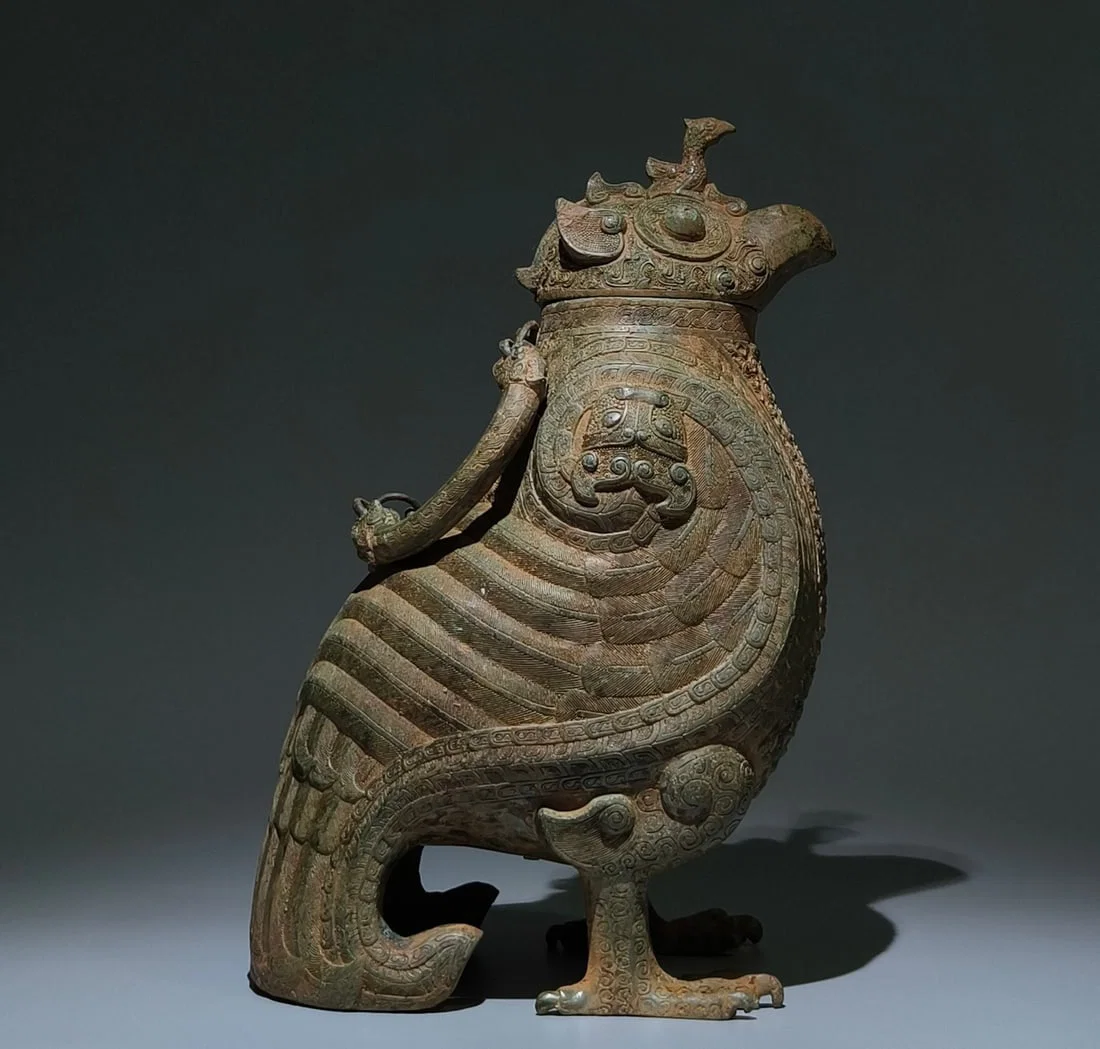 An Archaic Bronze Coiling Dragon Pattern Bird-Shaped Zun,With Inscription