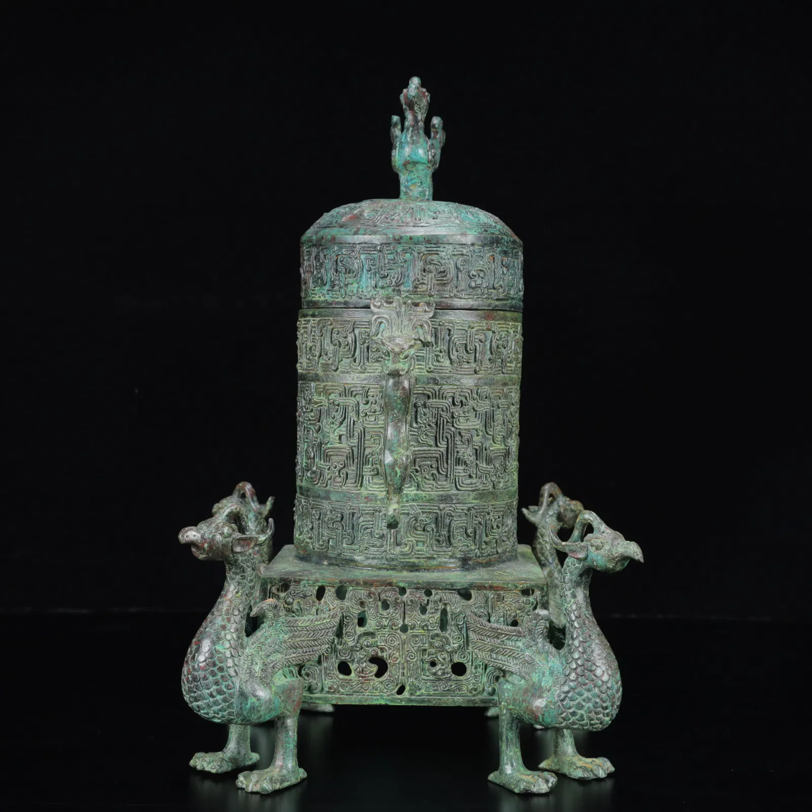 An Archaic Bronze Dragon-Ears Phoenix Legs Vase
