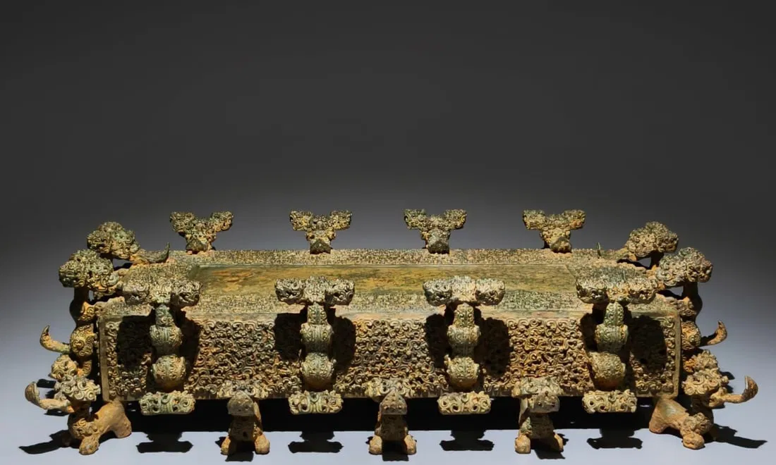 An Archaic Bronze Hollow Auspicious Cloud Pattern Ornament,With Inscription