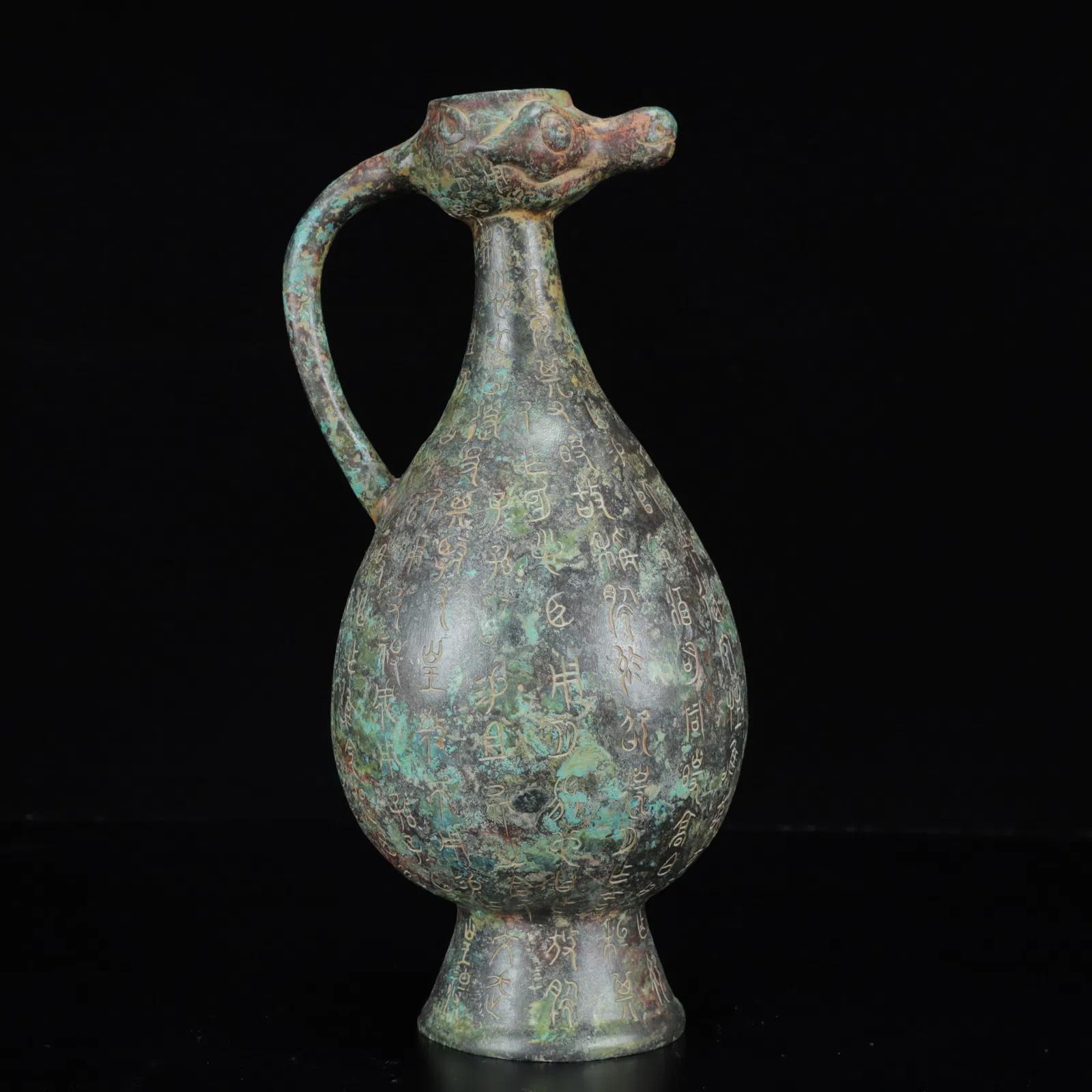 An Archaic Bronze Inscription Auspicious Beast Ewer