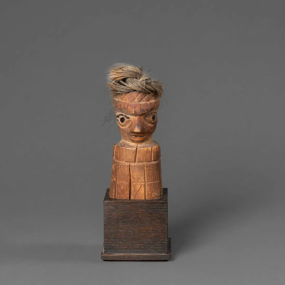 An Early Northwest Coast wood carved figure