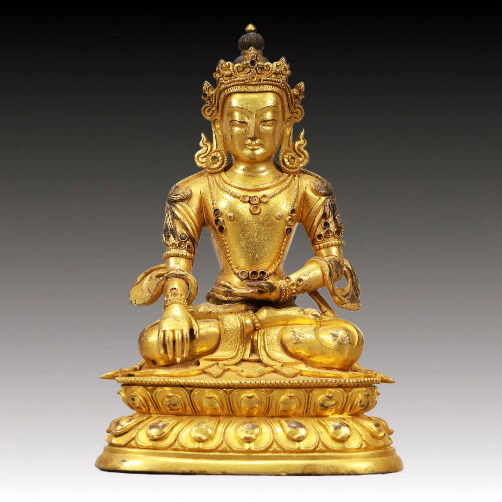 An Excellent Gilt-Bronze Figure Of Longevity Buddha