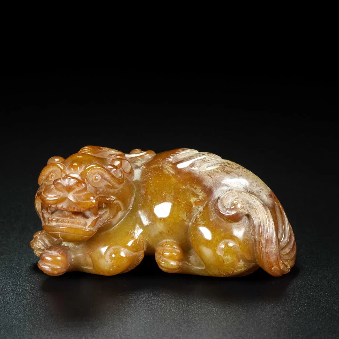 An Exquisite Archaic Jade Beast Ornament