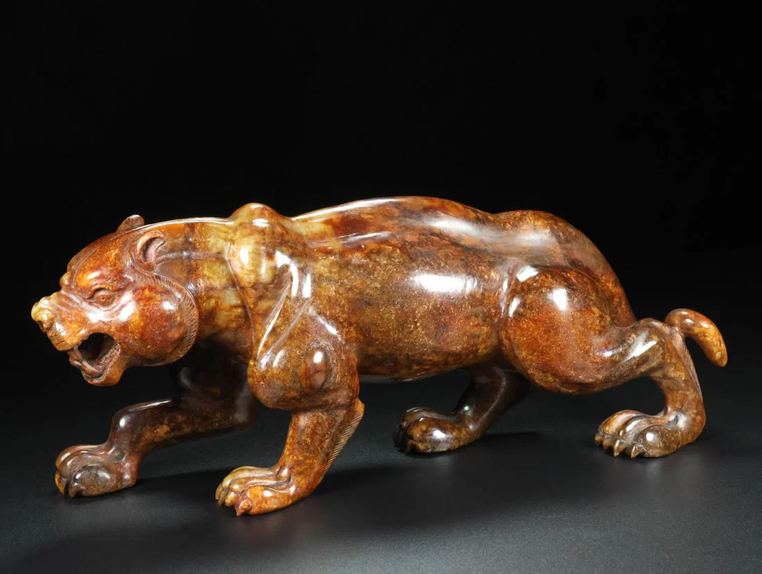 An Exquisite Archaic Jade Tiger Ornament