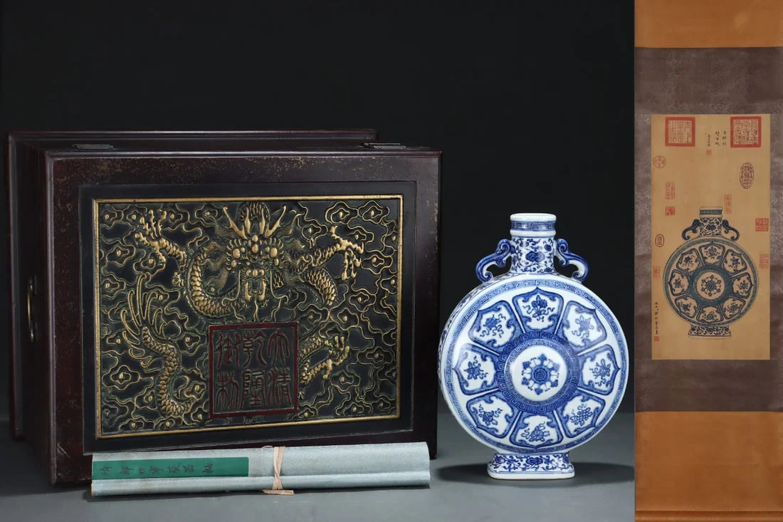 An Exquisite Blue and White Eight Treasures Pattern Double-Ears Vase,with Chinese Vertical Scroll