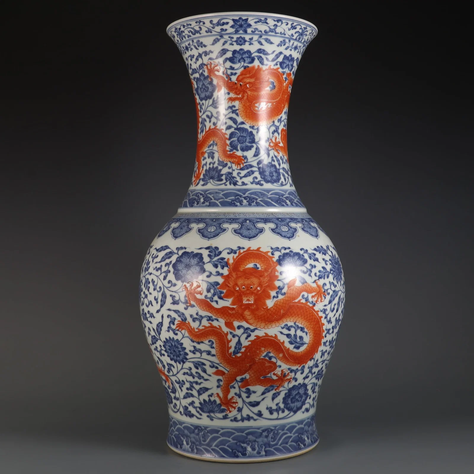 An Exquisite Blue and White Iron-Red Lotus and Dragon Pattern Vase