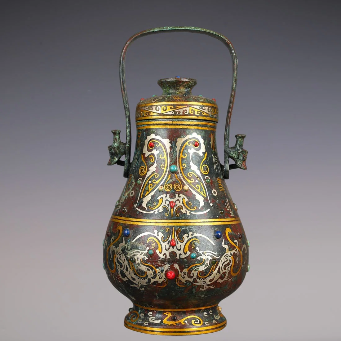 An Exquisite Bronze Inlaid Gold Inlaid Gems Dragon Pattern Ewer